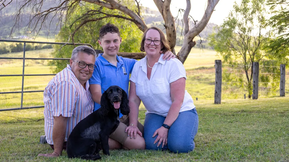 Family portrait photographed outdoors on a Darling Downs property