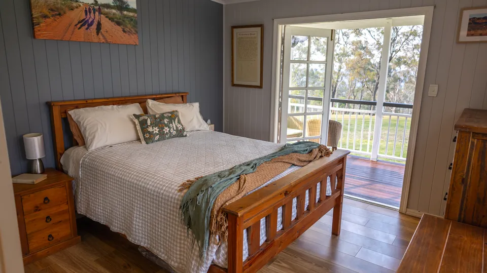 Bedroom interior of a Queenslander homestead photographed for a rural listing